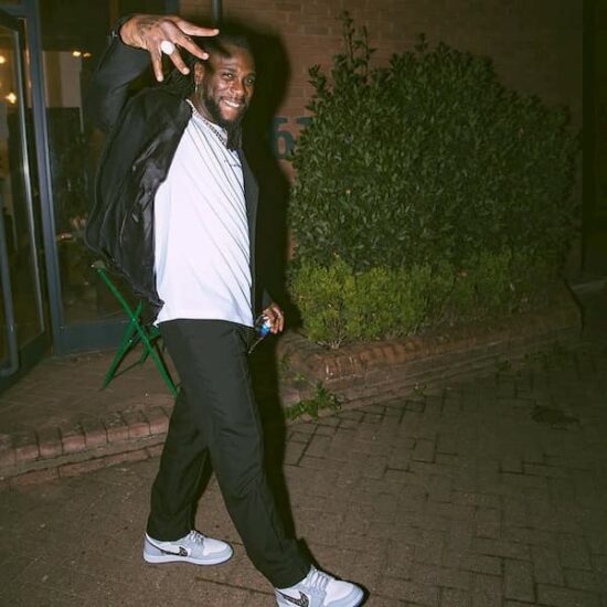 Burna Boy throws shade at his colleagues