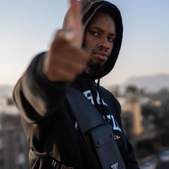 Denzel Curry replies fan who asks if he would collaborate with Travis Scott.