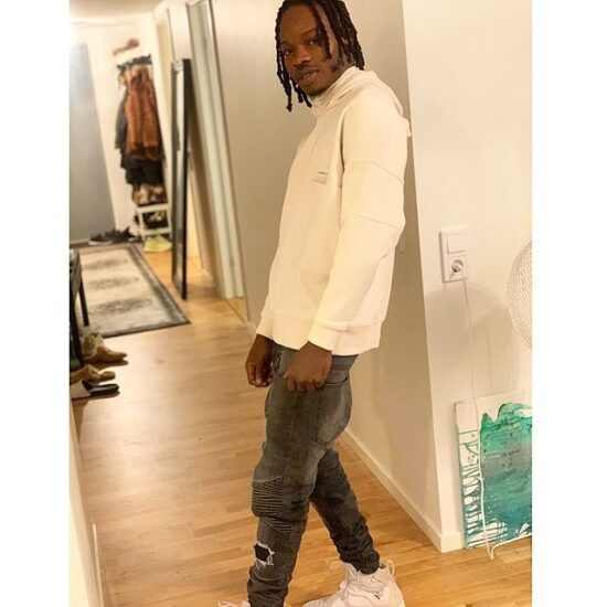 Naira Marley gifts himself a customized diamond neck chain (Video)