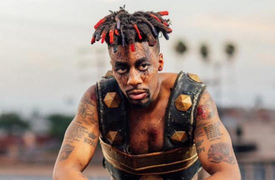 Canadian Rapper Dax Tattoos Nigerian Flag on His Neck