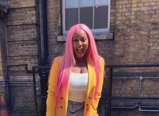 DJ Cuppy watches Monaco Grand Prix from her family home balcony