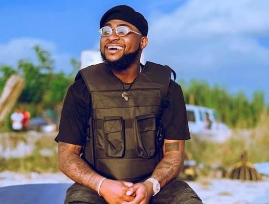 Reactions as Davido flaunts his Frog styled Necklace