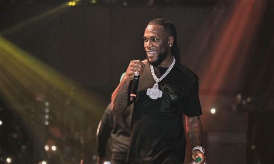 Burna Boy praises his father, says he aspires to be half the man he is