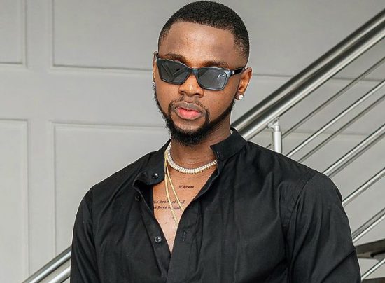 Kizz Daniel Showcases His daddy skills