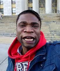 Speed Darlington reacts as sculptor messes up his face on an ashtray