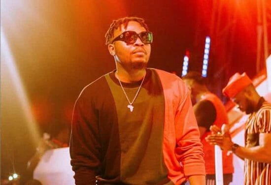 Reactions as Olamide slams a fan who sought his assistance