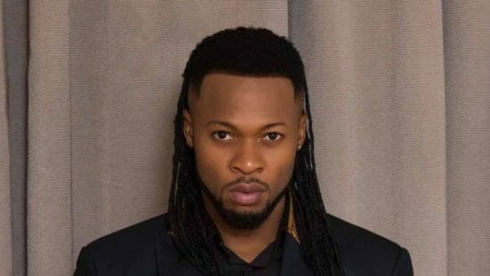 Flavour blocks a man from spraying money bundles on his head