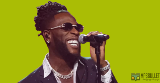 Burna Boy in awe as an artist uses real diamonds to make an artwork of him.