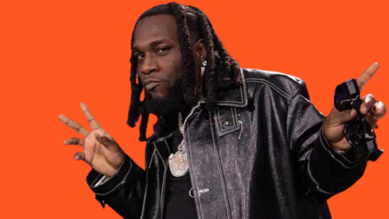 Burna Boy compensates Journalist whose Camera got broken