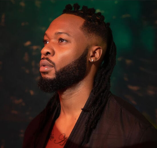 Flavour reveals his religious side by studying the Bible with his mother.