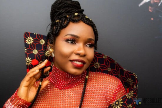 Yemi Alade slams troll who advised her to give birth this year