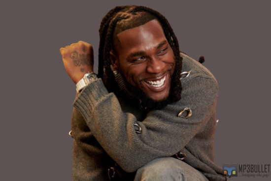 Young fan meets with Burna Boy on her 12th birthday, receives cash from singer