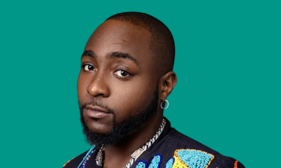 Davido gifts his cleaner an iPhone 14 Pro Max