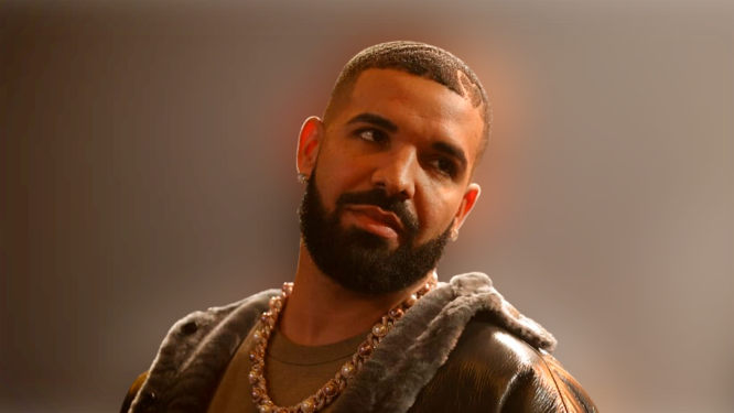 Drake reacts after fan throws'disgusting' boxer on stage