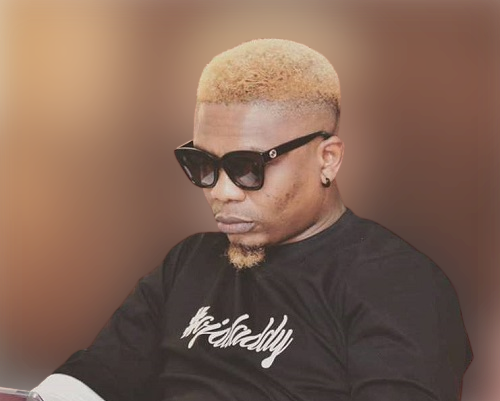 Reminisce warns trolls against dragging his family